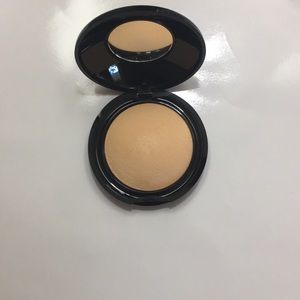 Pat Mcgrath Labs under eye setting powder in yellow.